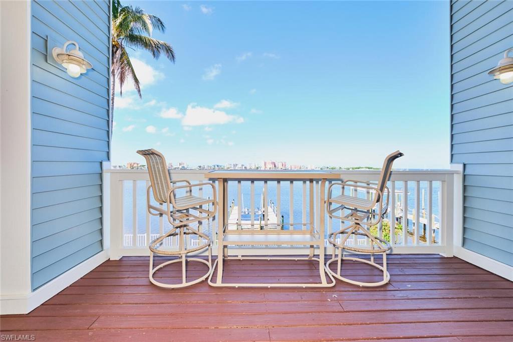 Main living area - Wooden deck with a water view