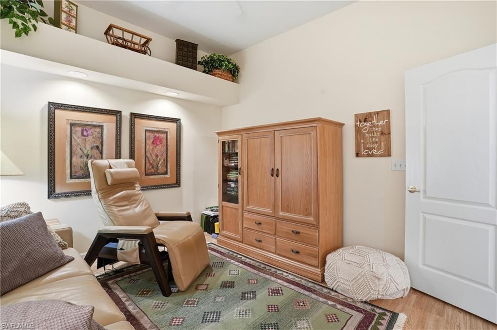 Sitting room featuring light wood-type flooring