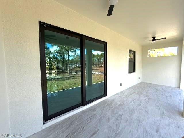 View of patio / terrace featuring a ceiling fan