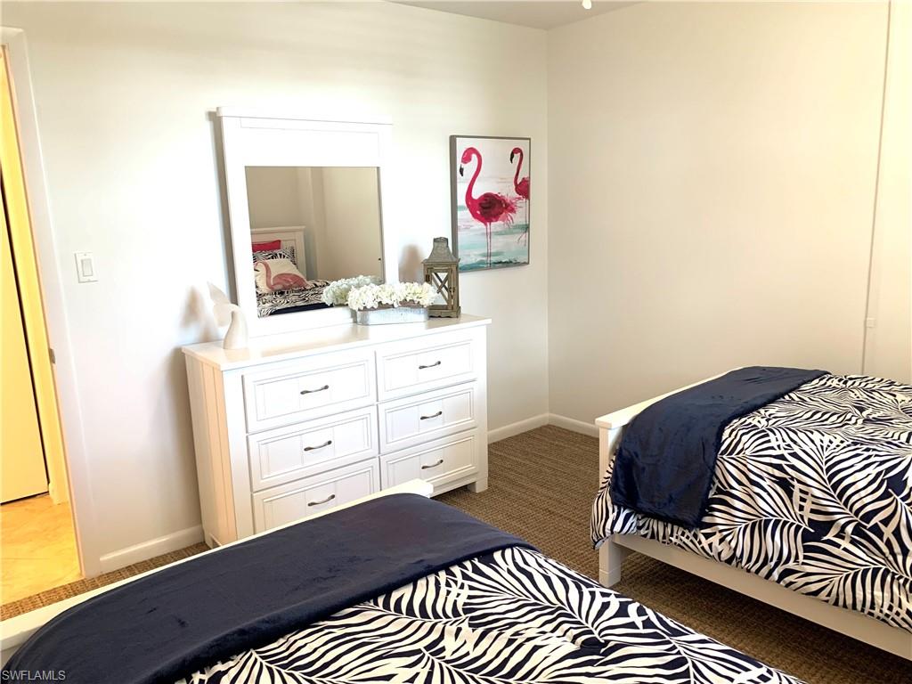 Bedroom featuring baseboards