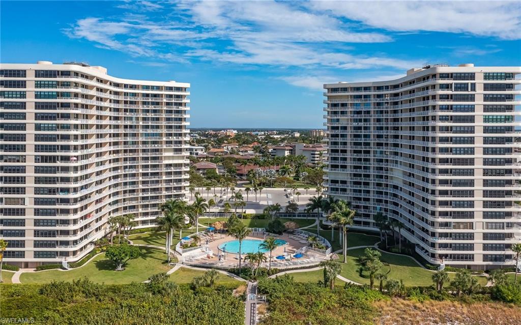 View of apartment building / complex featuring a city view