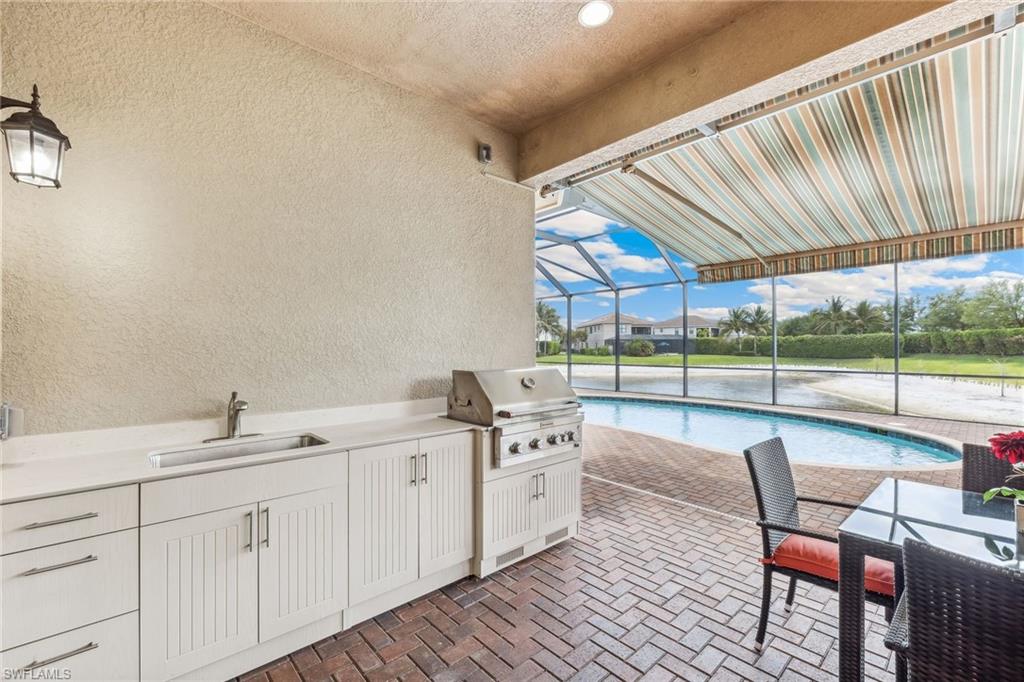 Outdoor kitchen with new grill