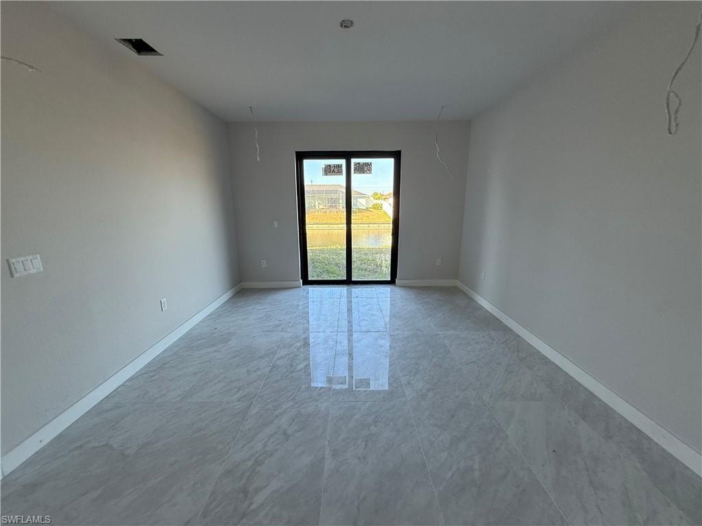 Spare room with baseboards