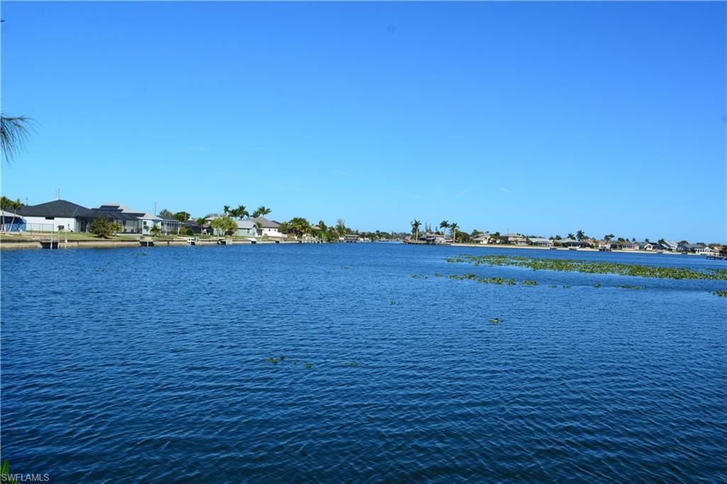 Water view featuring nearby suburban area