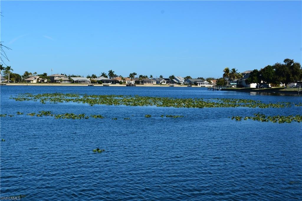 Water view featuring nearby suburban area