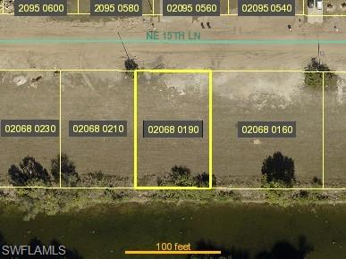 Aerial overview of property's location with property parcel outlined