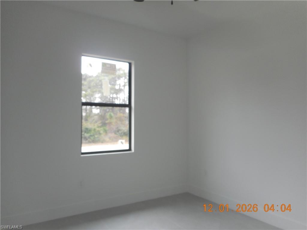Spare room with baseboards