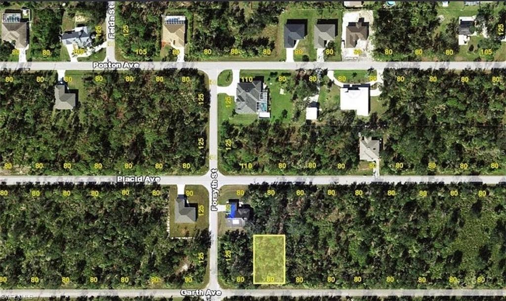 Aerial map of property and surrounding area featuring property parcel outlined