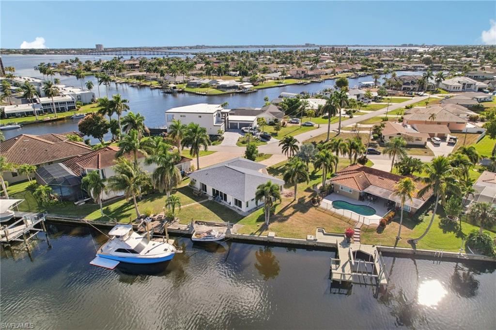 Aerial view of residential area with a nearby body of water