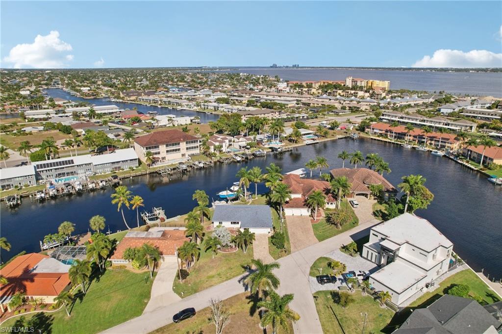 Aerial view of residential area with a nearby body of water