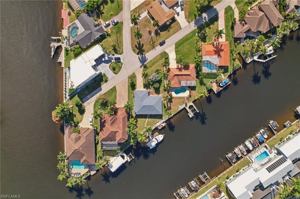 View of property location with nearby suburban area and a large body of water