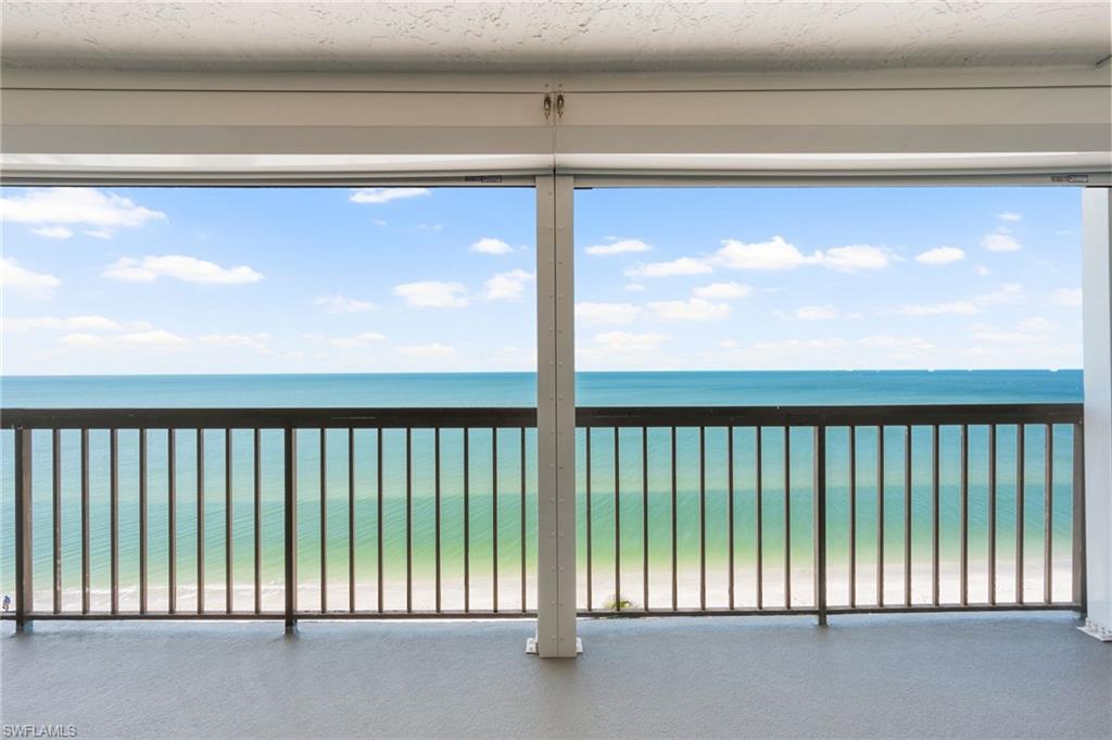 Spectacular gulf beach view from balcony with peace of mind new electric roll down hurricane shutters.