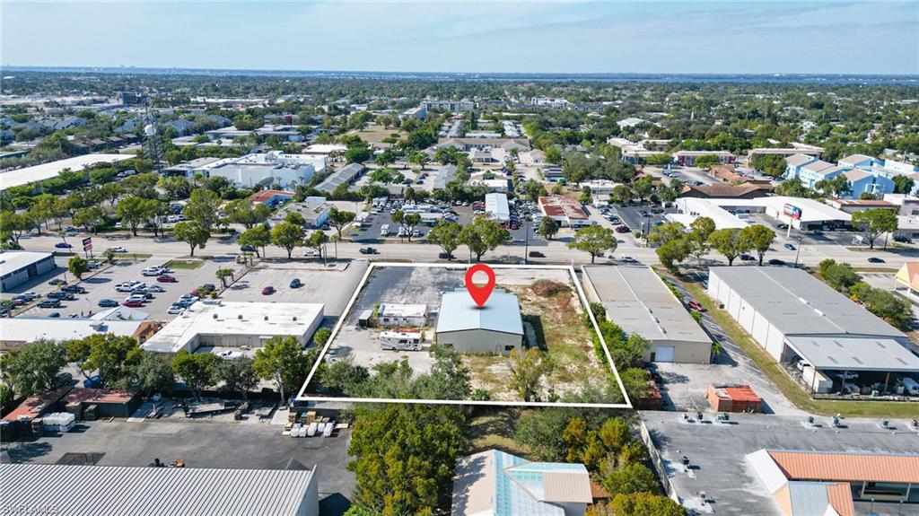 Aerial view of property's location featuring property parcel outlined