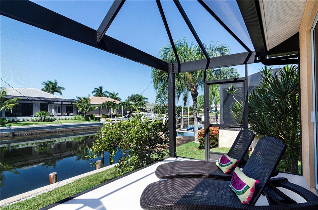 View of patio / terrace with a water view