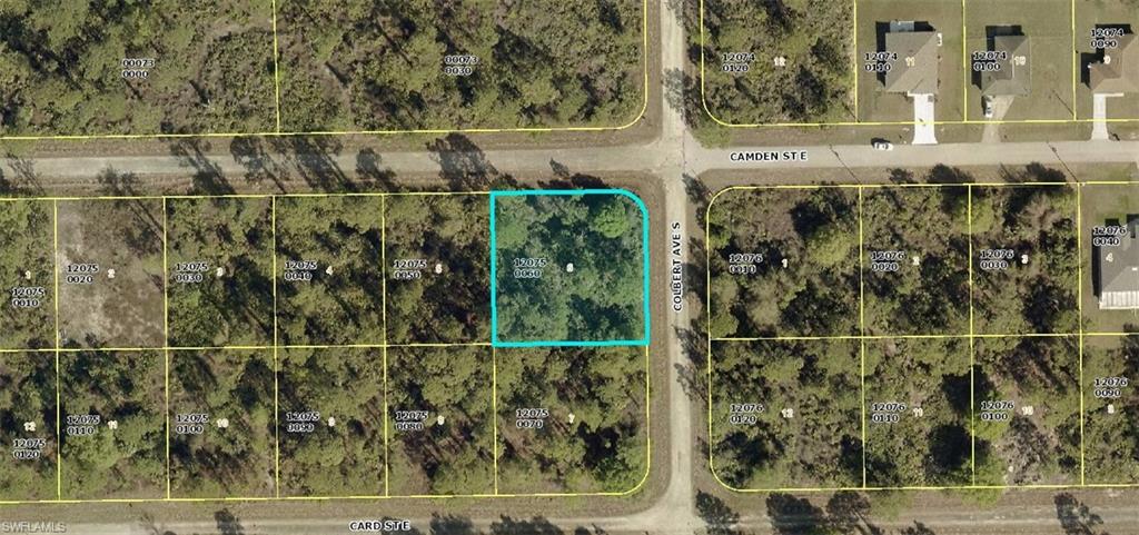 Aerial map of property and surrounding area featuring property parcel outlined