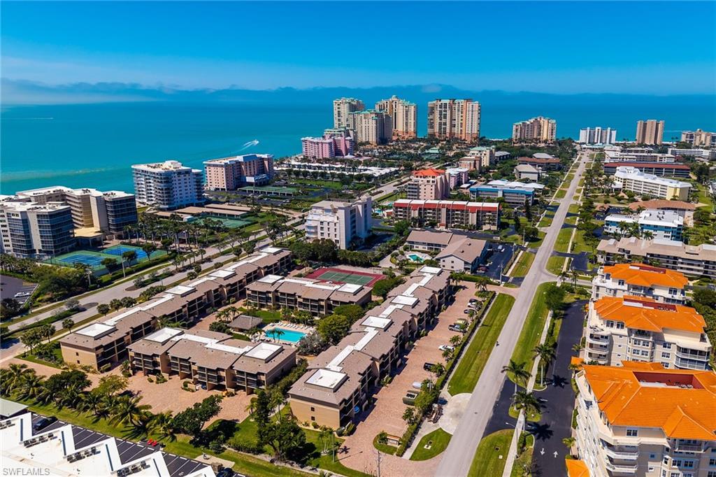 View of urban area featuring a nearby body of water
