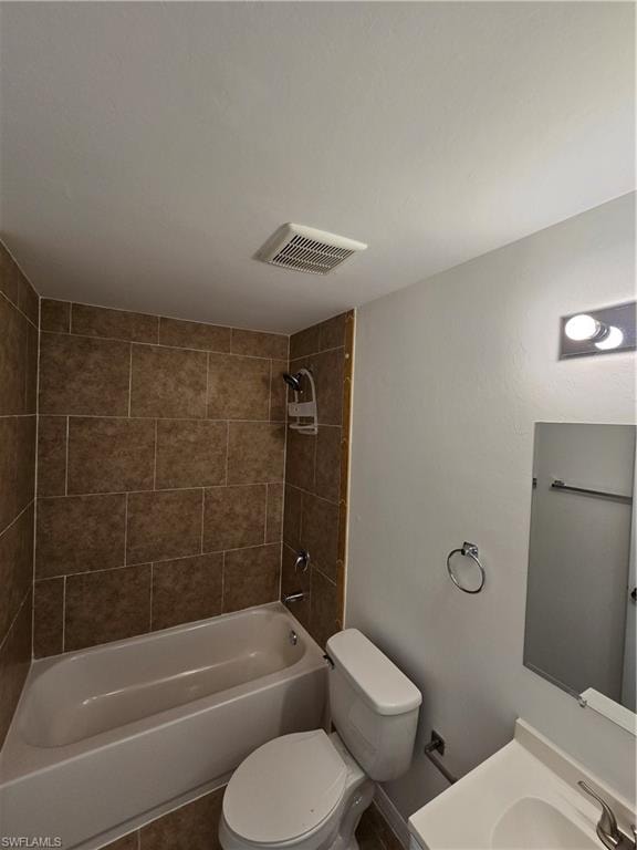 Full bathroom featuring vanity and bathing tub / shower combination
