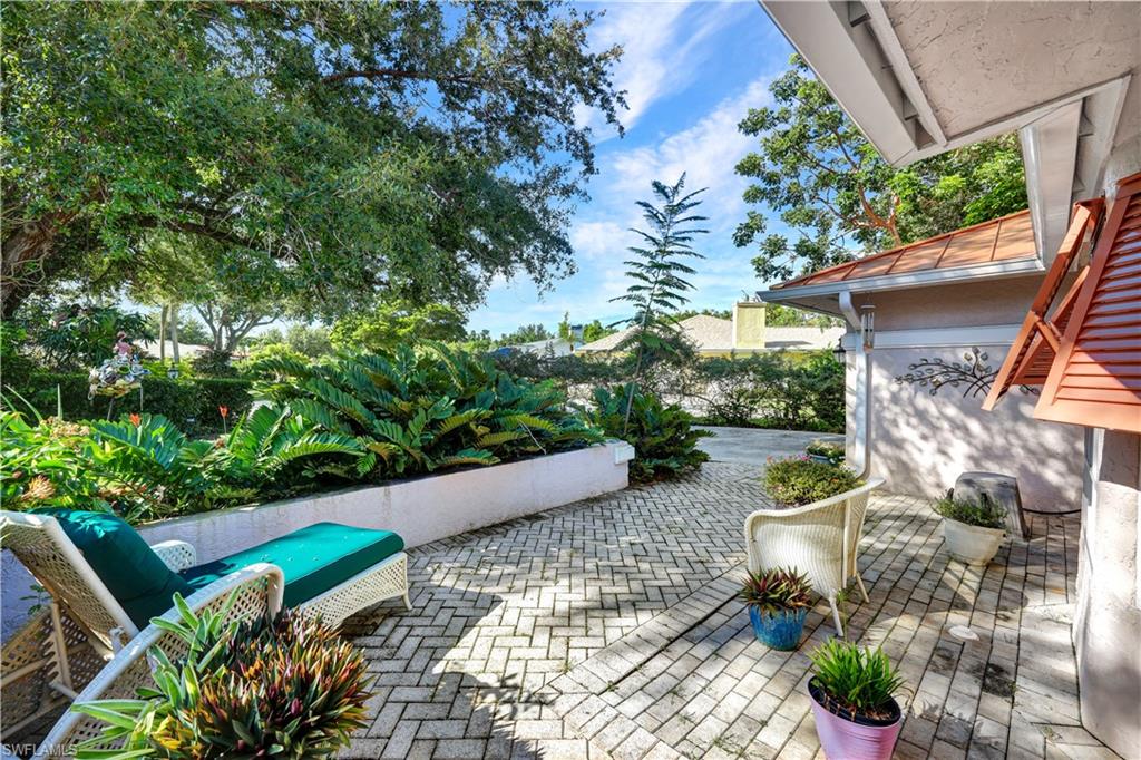 Front entry patio surrounded by specimen plantings