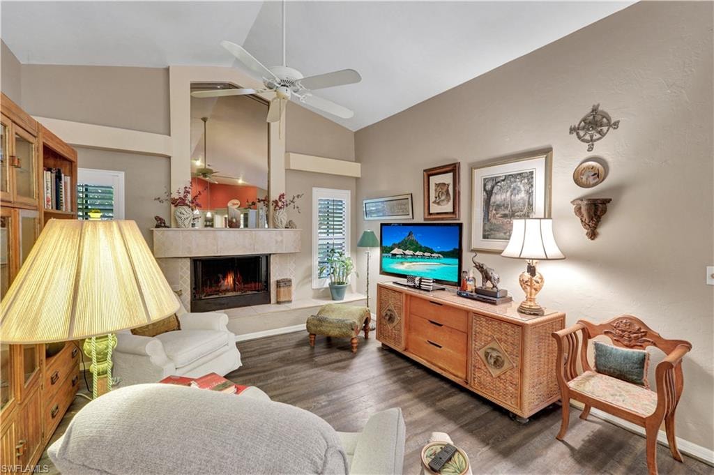 Cathedral ceiling w/woodburning fireplace, tiled ledge