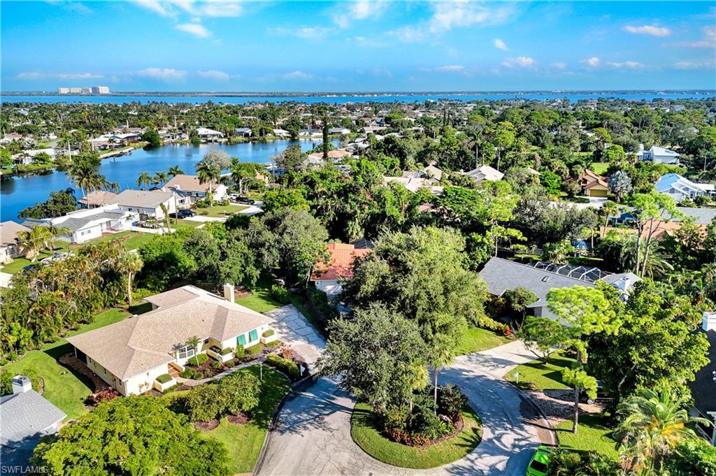 A view that depicts larger, vegetated homesites