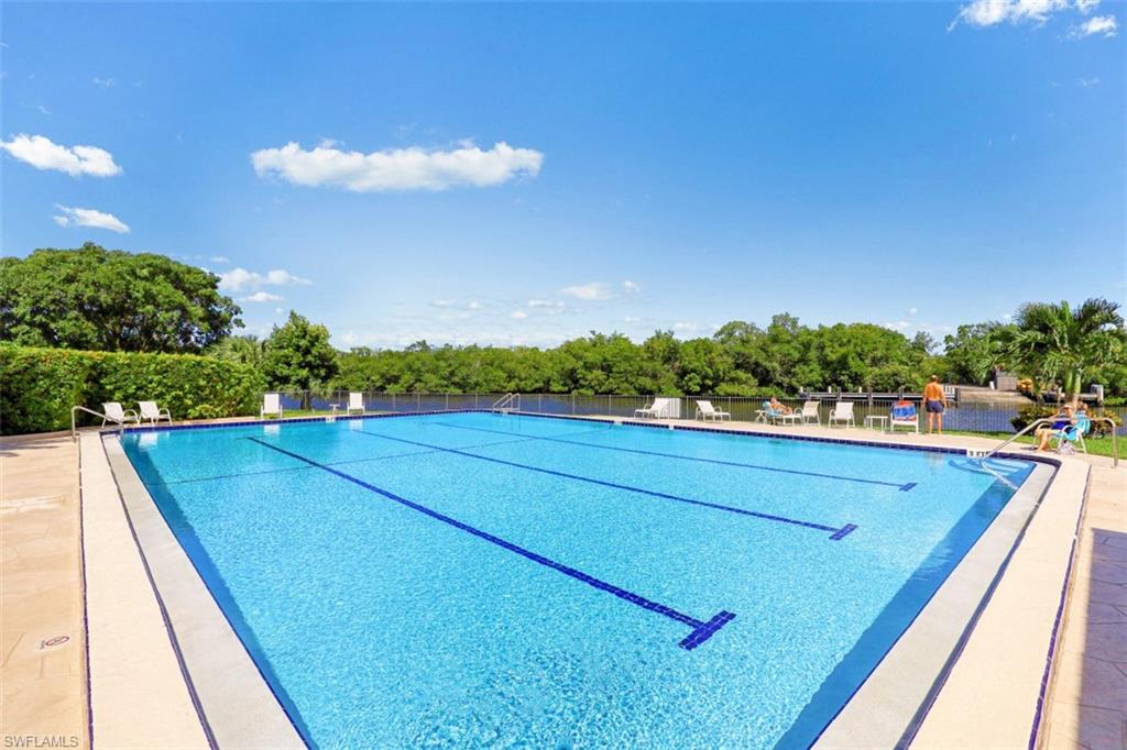 Community pool featuring a patio area