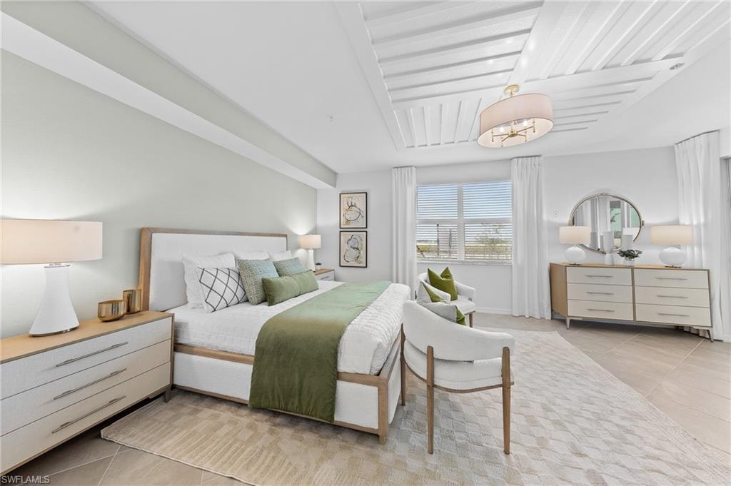 Bedroom with light tile patterned floors