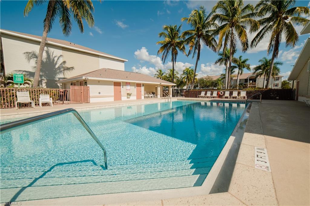 Community pool with a patio area