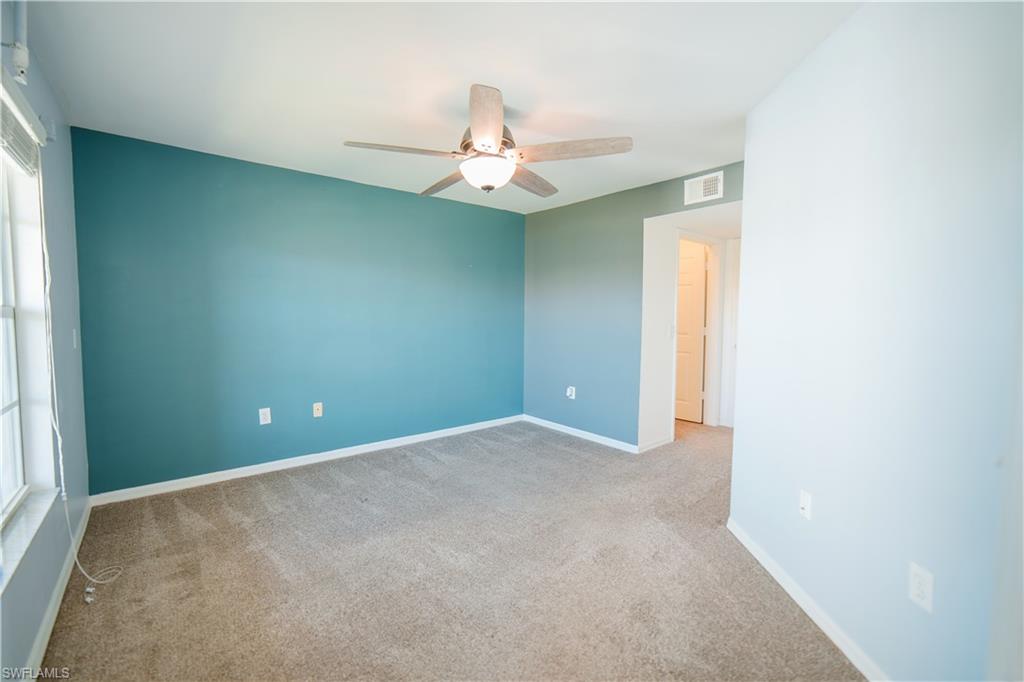 Primary Bedroom with view of water