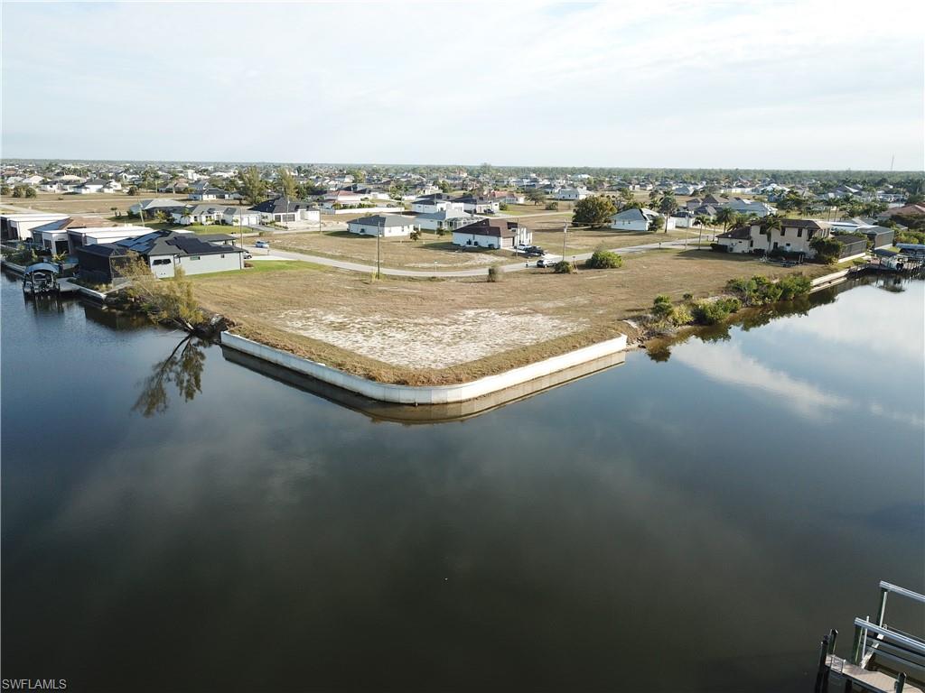 Aerial view of residential area with a nearby body of water
