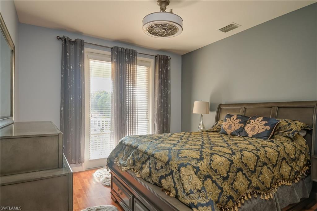 Bedroom with light wood-style floors