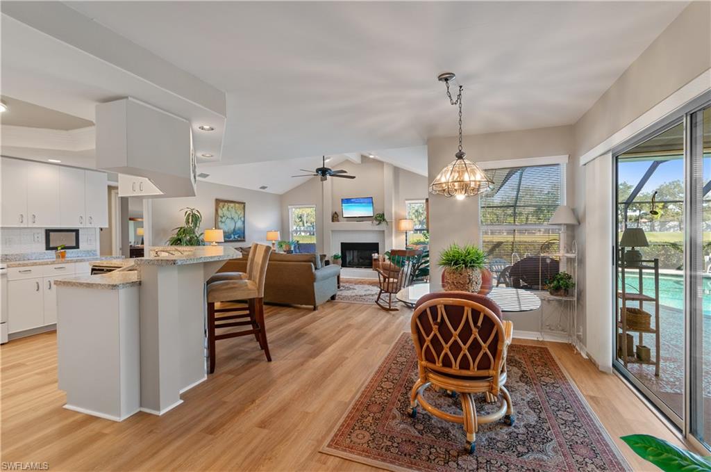 As you walk in from living room you are greeted with a large kitchen and family room with plenty of natural lighting