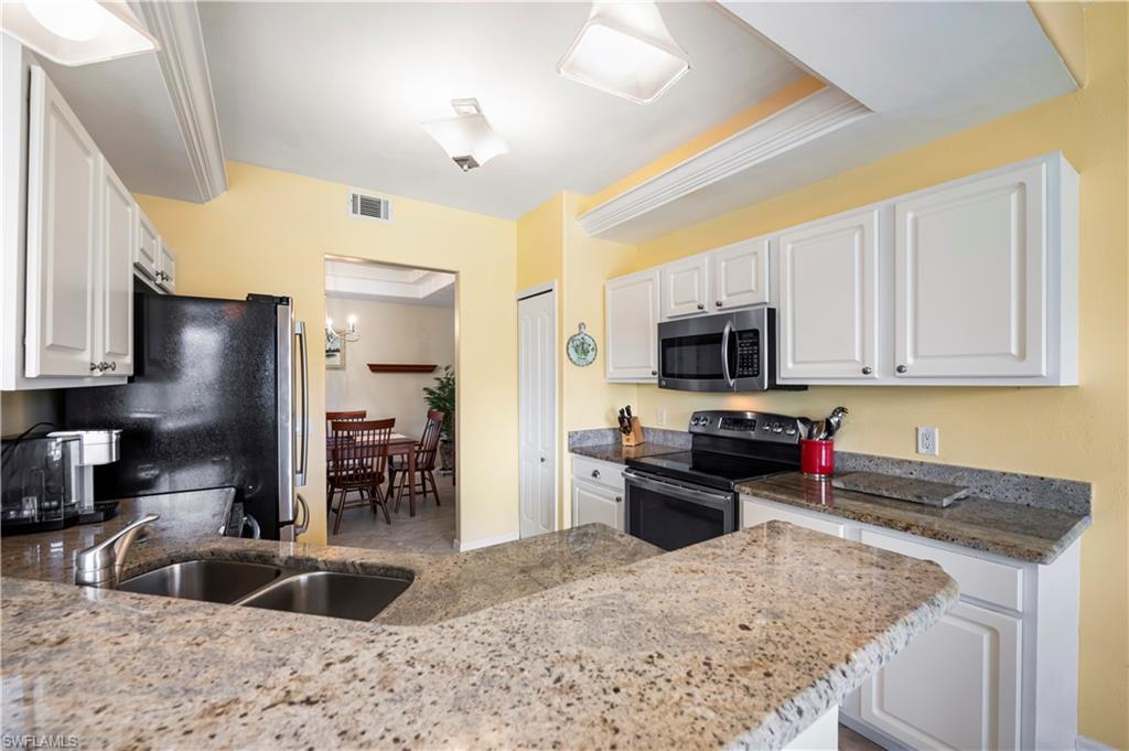 Stainless Steel appliance, granite countertops.