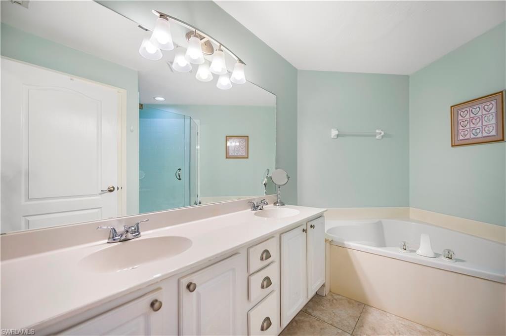 Ensuite bath has dual vanities, soaking tub and a walk in shower.