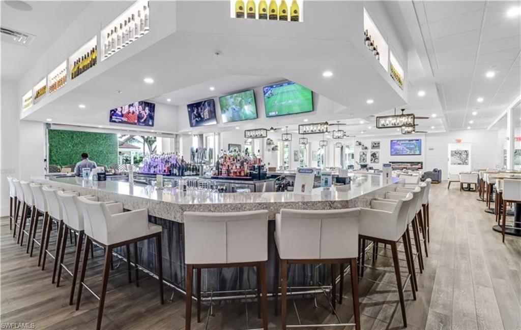 Bar with light stone countertops
