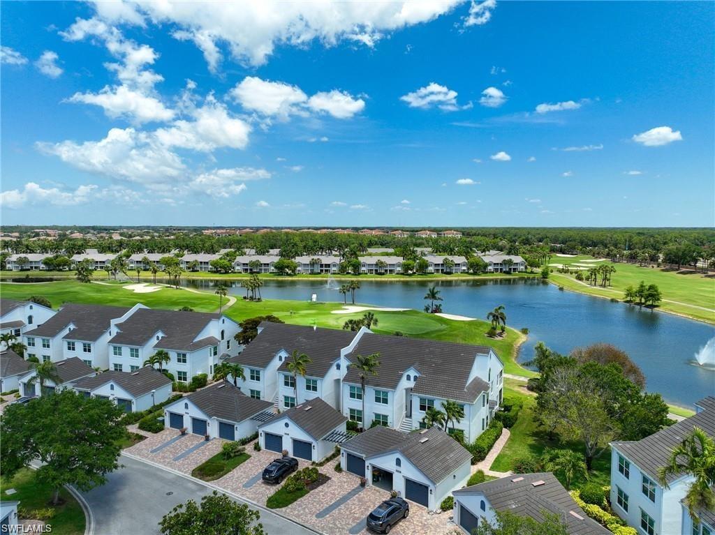Drone / aerial view of a golf club and a large body of water