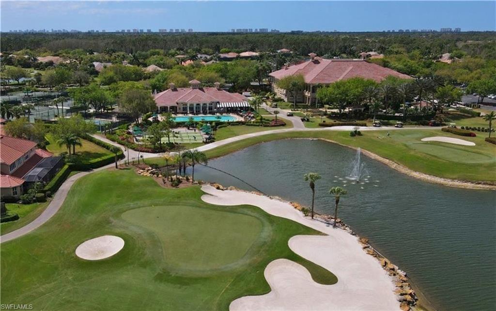 Drone / aerial view of a golf club and a large body of water