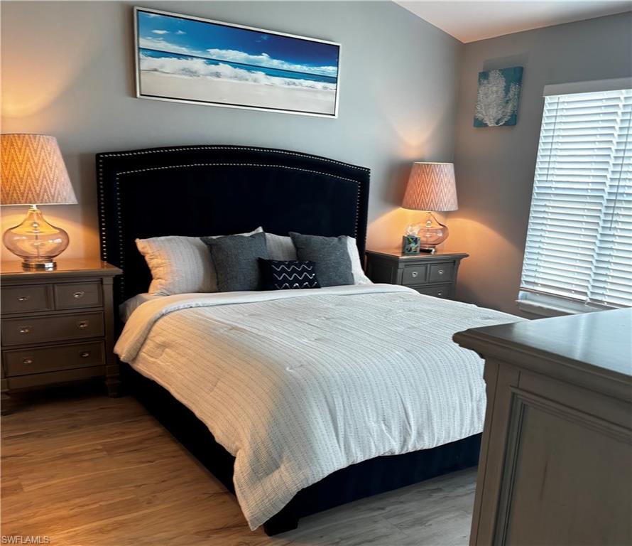 Bedroom with light wood-style flooring