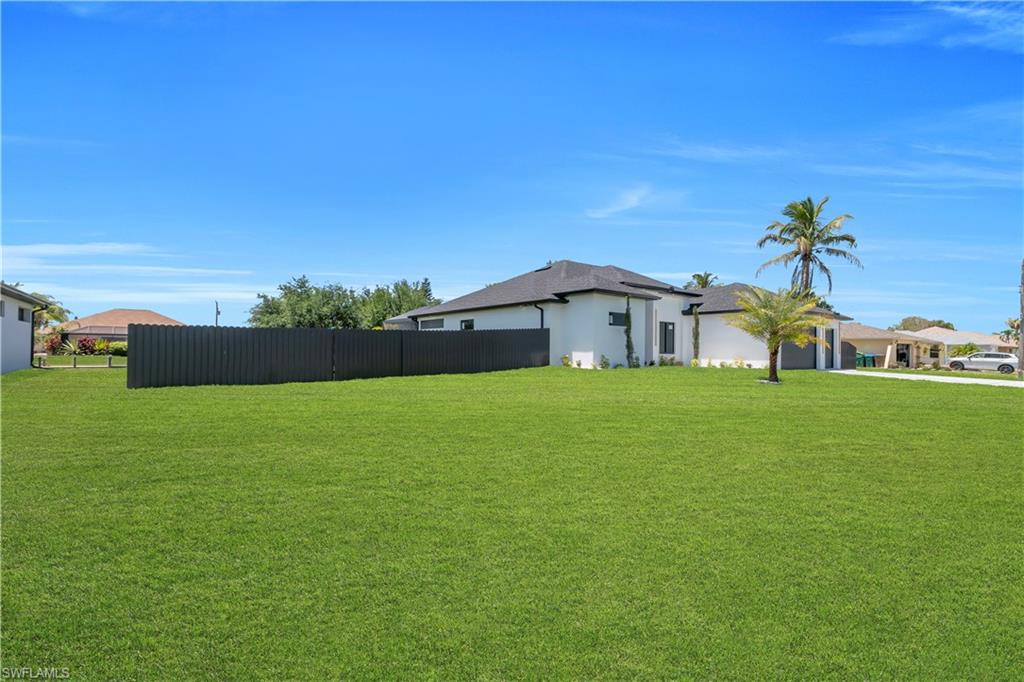 Expansive green lawn providing ample outdoor space