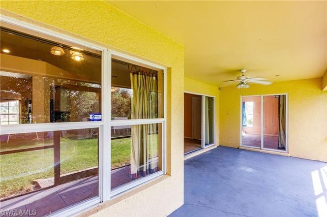 View of patio with ceiling fan