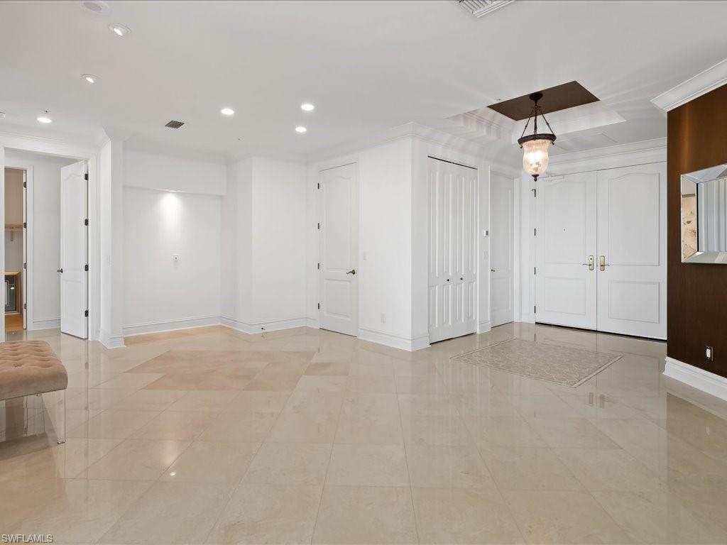 Unfurnished room featuring recessed lighting and baseboards