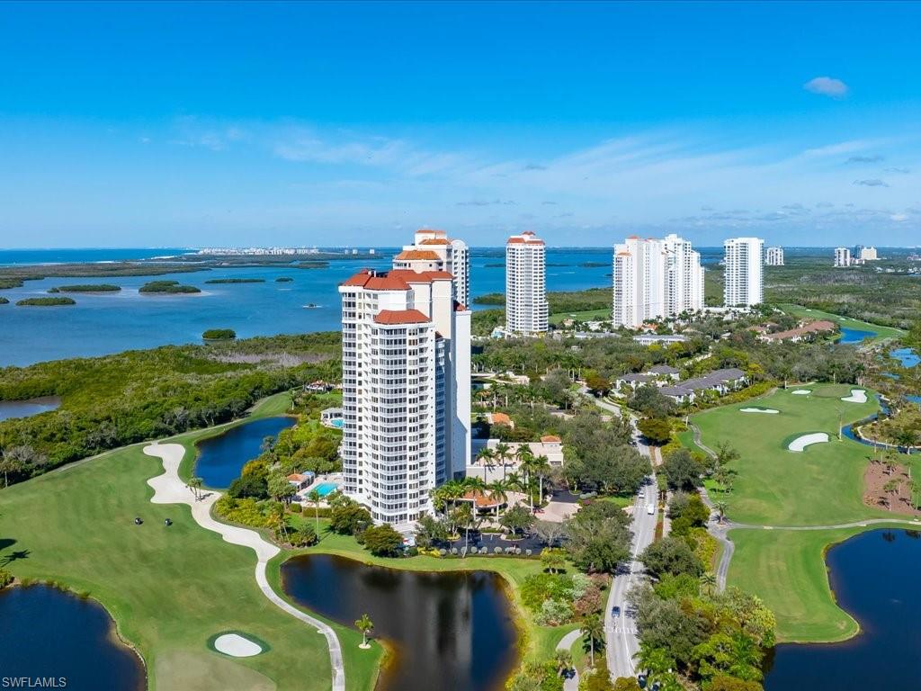 Aerial view of a nearby body of water and a golf club