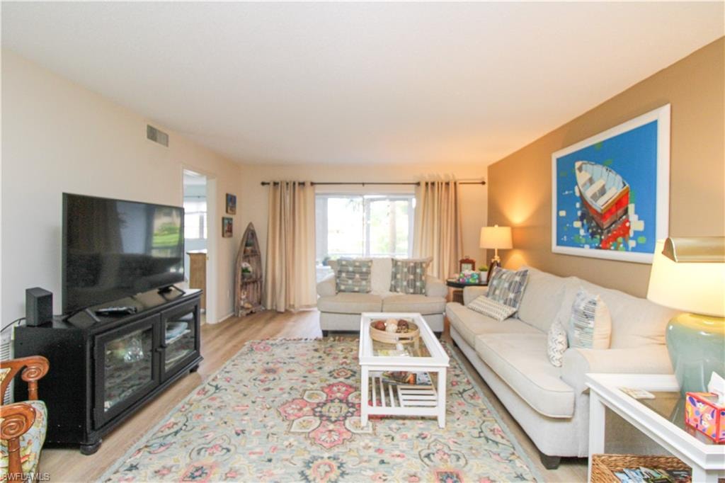 Living room featuring light hardwood / wood-style floors