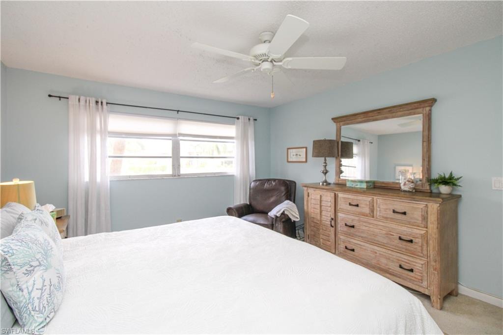 Bedroom featuring carpet flooring and ceiling fan