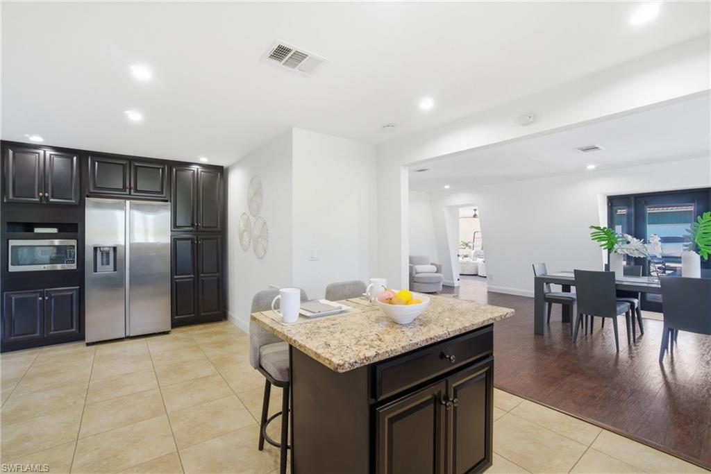 The island serves as extra prep space as well as an additional dining space for those quick bites
