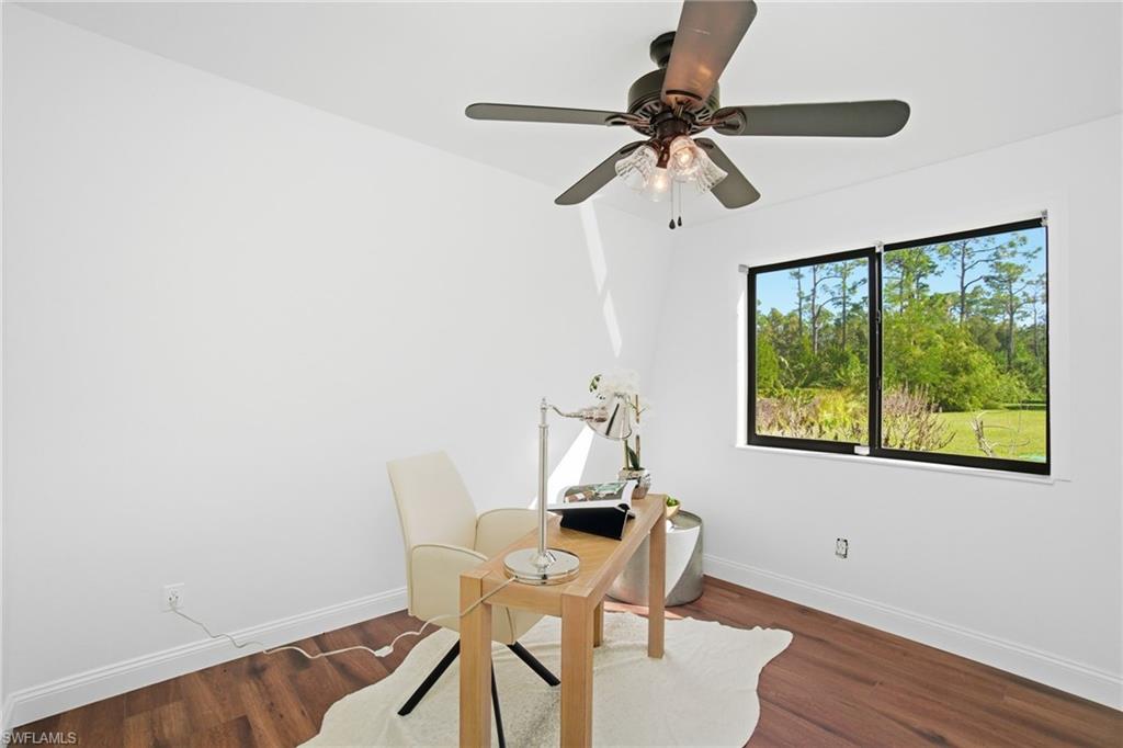 Downstairs is a 4th bedroom, which is staged as an office