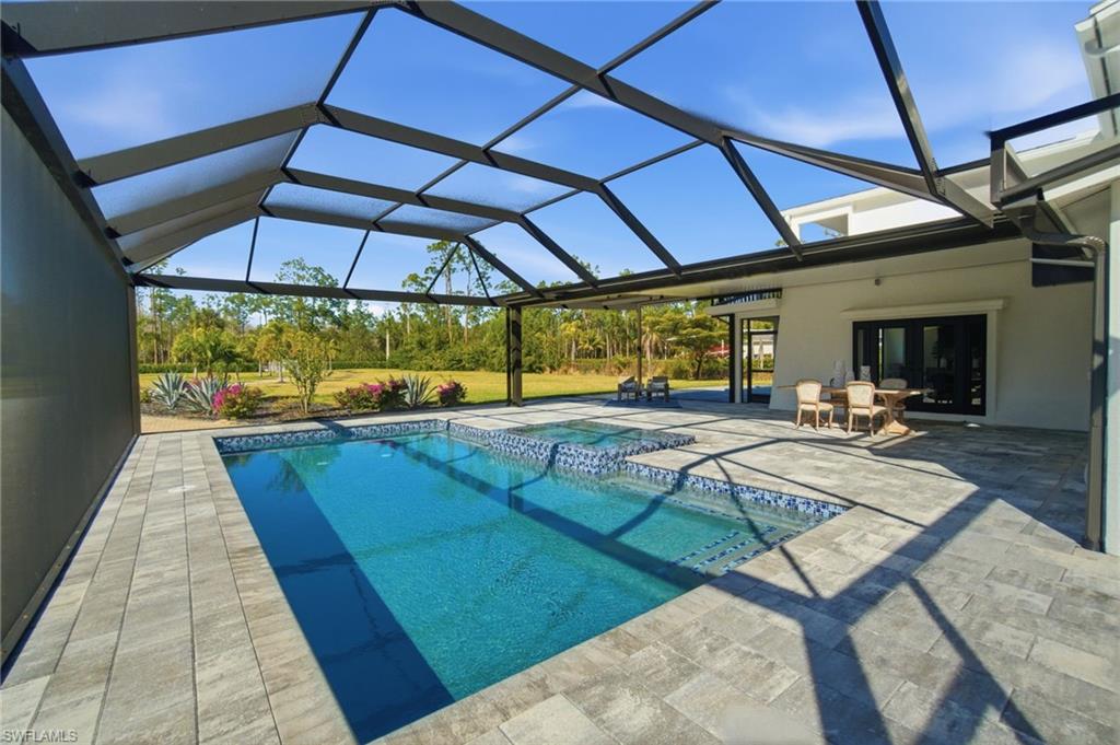 Plenty of covered space by the pool - ideal for entertaining, or family dining