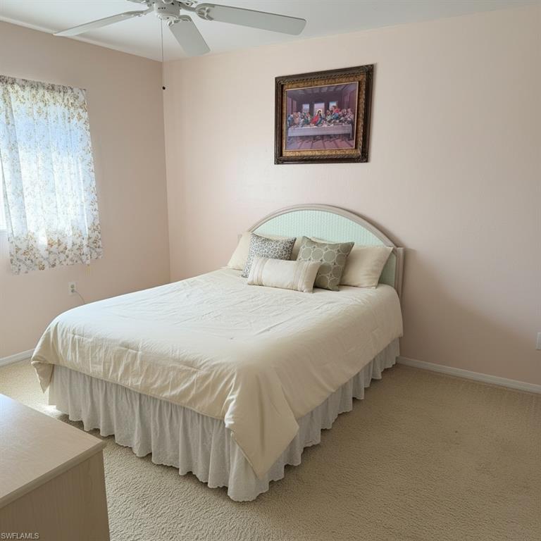 Primary bedroom with private bathroom and walk-in closet