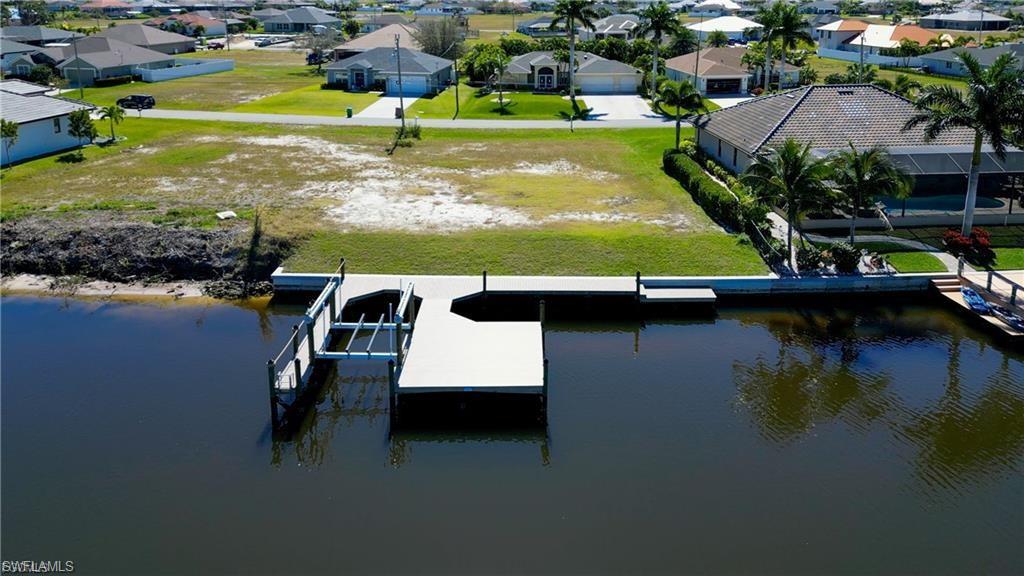 Composite dock built in 2022, 10,000 lb lift and boat slip.