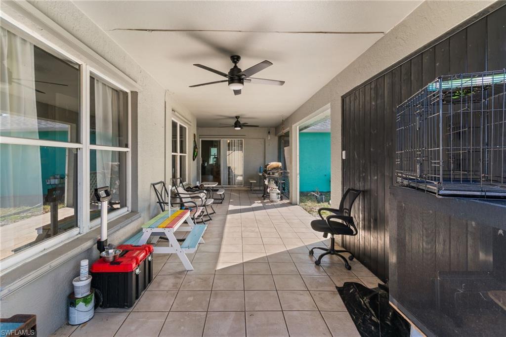 View of patio with ceiling fan