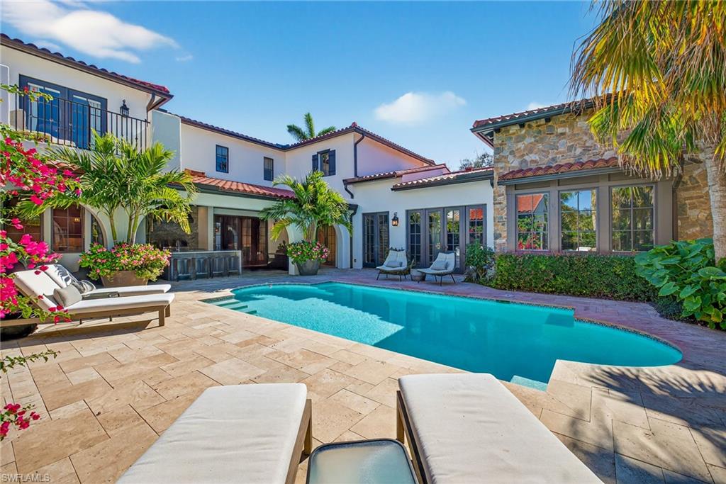 Swimming pool with a patio
